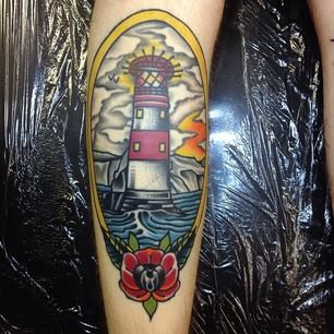 Traditional Lighthouse In Frame Tattoo Design For Leg