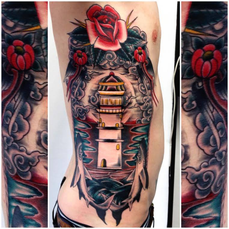 Traditional Lighthouse In Frame Tattoo On Man Right Side Rib By Sam Ricketts