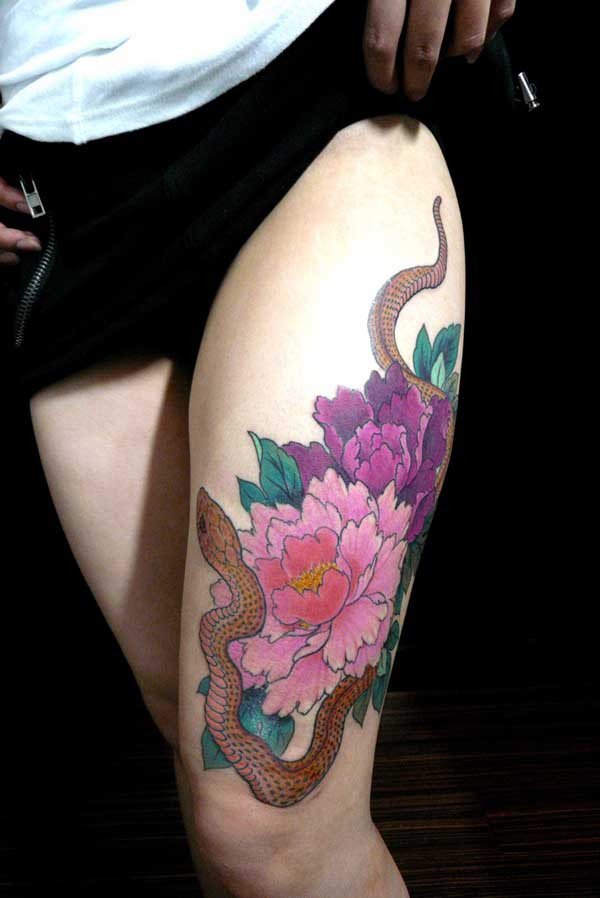 Traditional Peony Flowers With Snake Tattoo On Women Left Thigh