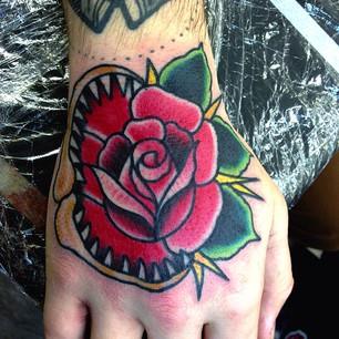 Traditional Rose Tattoo On Right Hand By Sam Ricketts