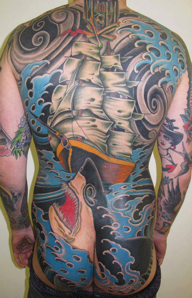 Traditional Shark With Ship Tattoo On Man Full Back By Sam Ricketts