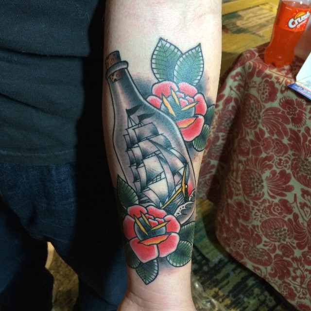 Traditional Ship In Bottle With Roses Tattoo On Forearm By Myke Chambers