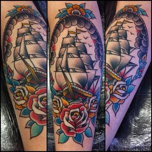 Traditional Ship In Frame With Roses Tattoo Design For Sleeve