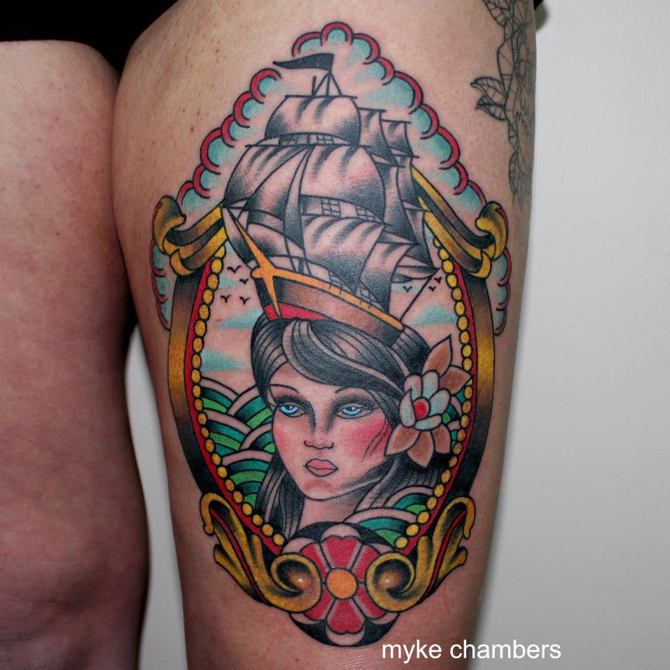 Traditional Ship On Women Head In Frame Tattoo On Thigh