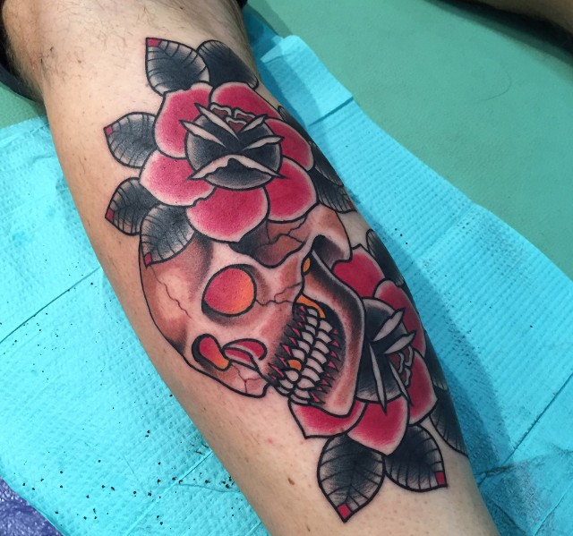 Traditional Skull With Flowers Tattoo On Leg Calf