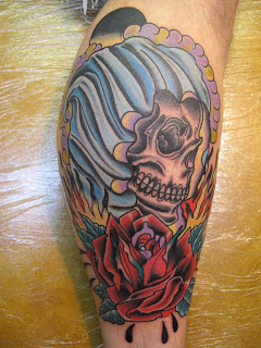 Traditional Skull With Rose Tattoo On Leg Calf