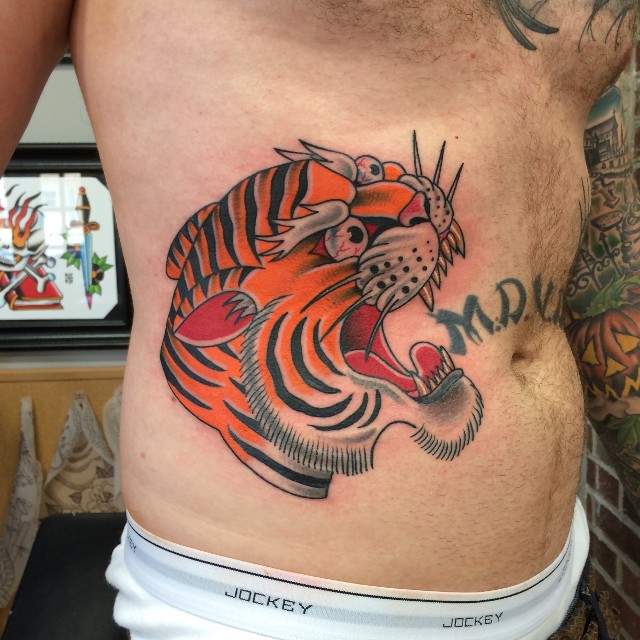 Traditional Tiger Head Tattoo On Right Side Rib