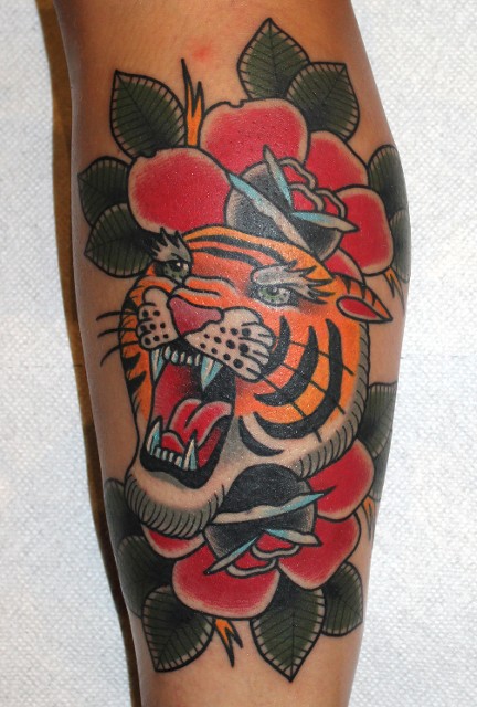 Traditional Tiger Head With Flower Tattoo On Leg Calf