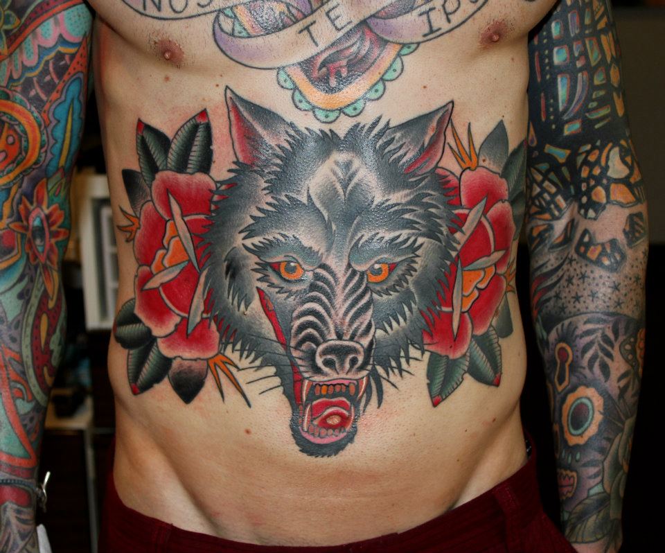 Traditional Wolf Head With Roses Tattoo On Man Stomach