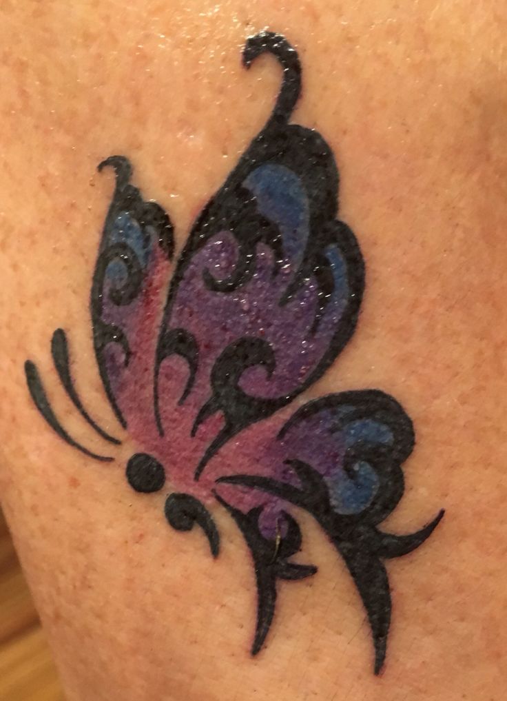 Tribal Colorful Butterfly Tattoo Idea