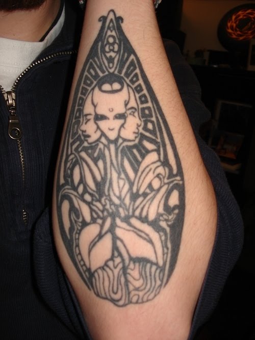 Unique Black Alien Tattoo On Left Arm