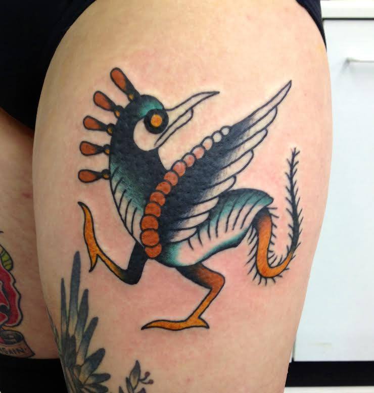 Unique Traditional Bird Tattoo On Thigh