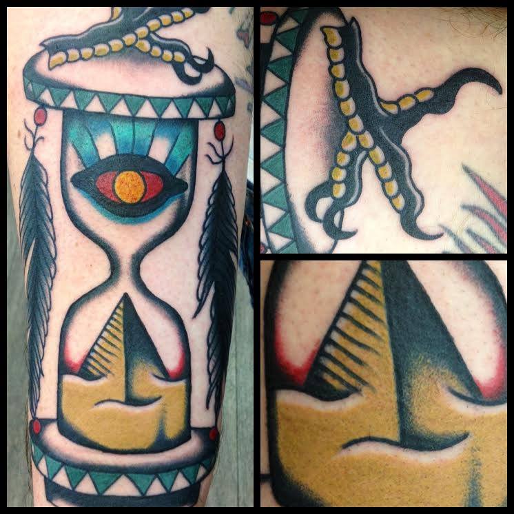 Unique Traditional Hourglass Tattoo On Half Sleeve