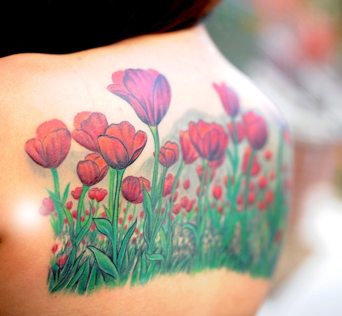 Upper Back Tulip Flowers Tattoos For Girls