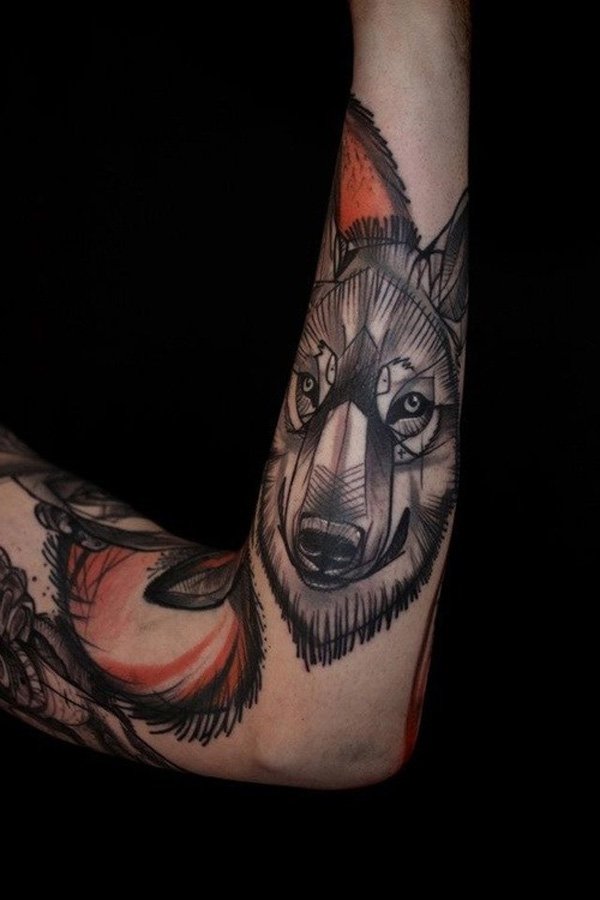 Wolf Head Tattoo On Left Arm