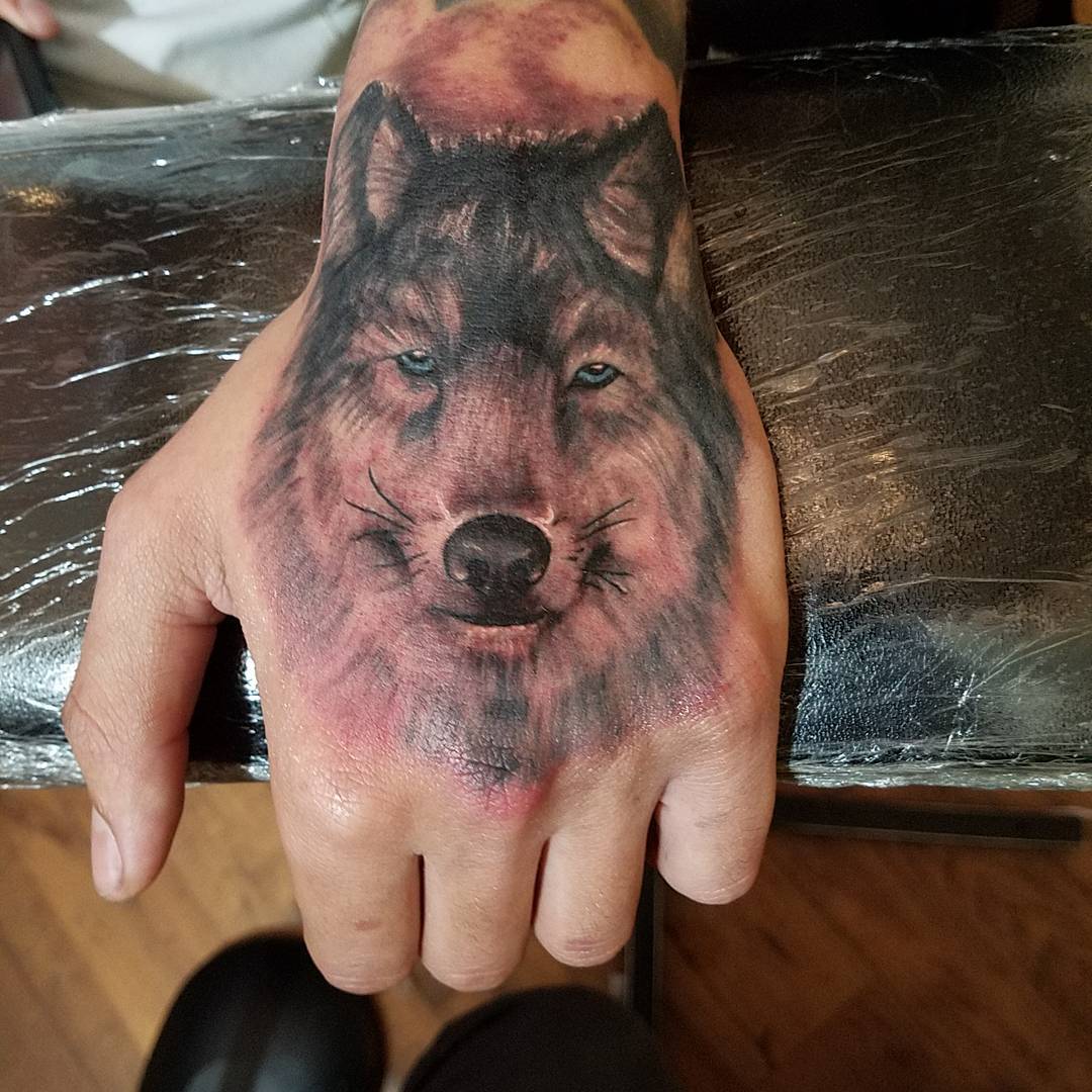 Wolf Head Tattoo On Left Hand