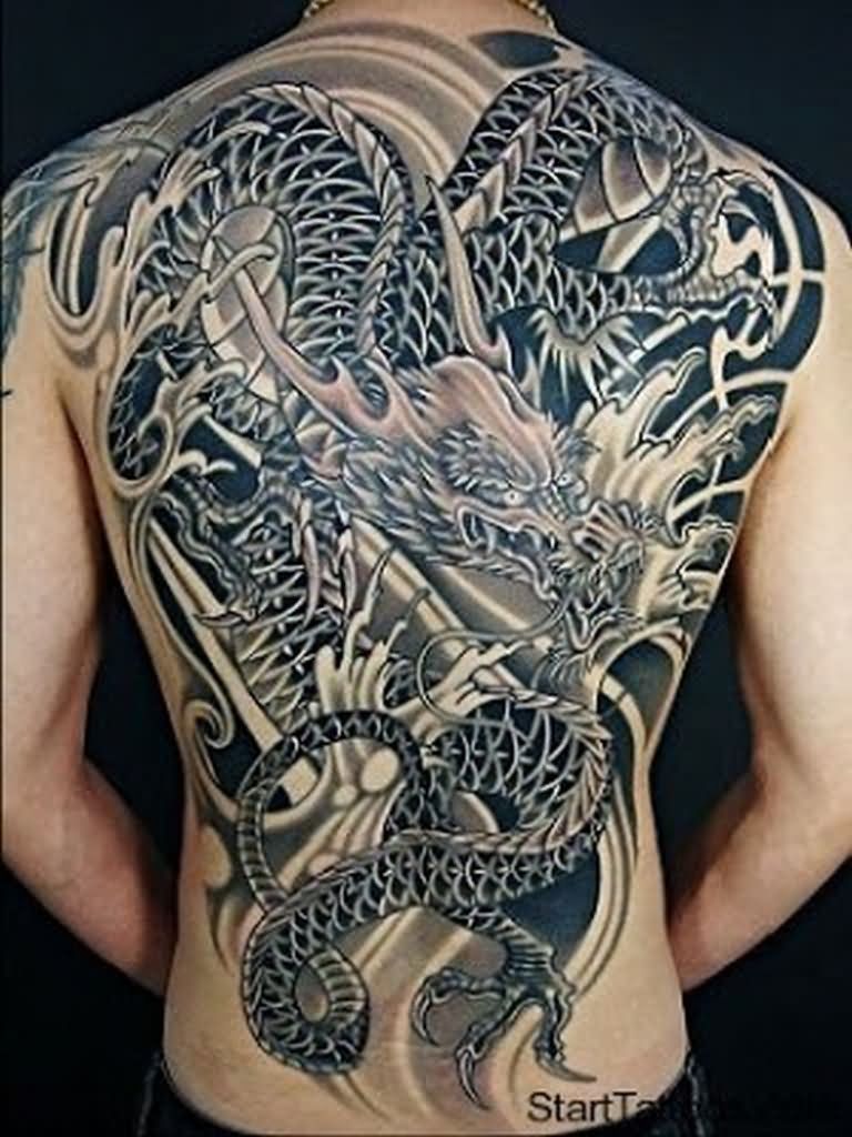 Wonderful Black Ink Dragon Tattoo On Full Back