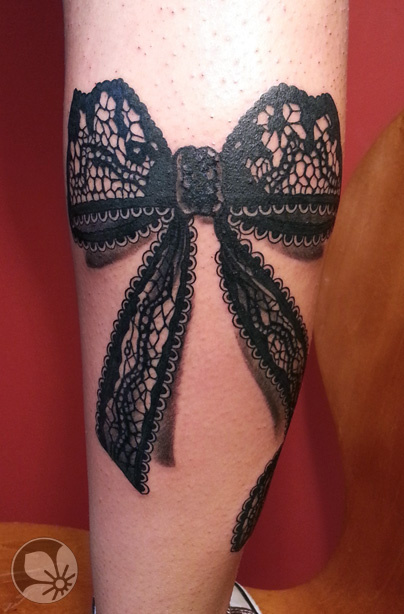 Wonderful Black Ink Lace Corset Bow Tattoo On Leg Calf