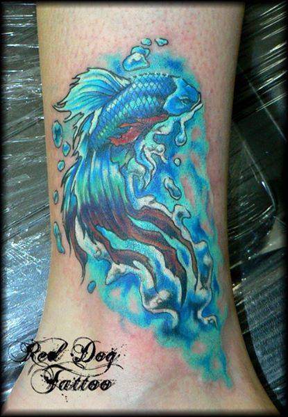 Wonderful Blue Ink Fish Tattoo On Right Ankle