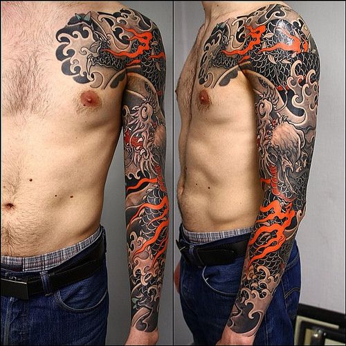 Wonderful Dragon Tattoo On Man Left Full Sleeve