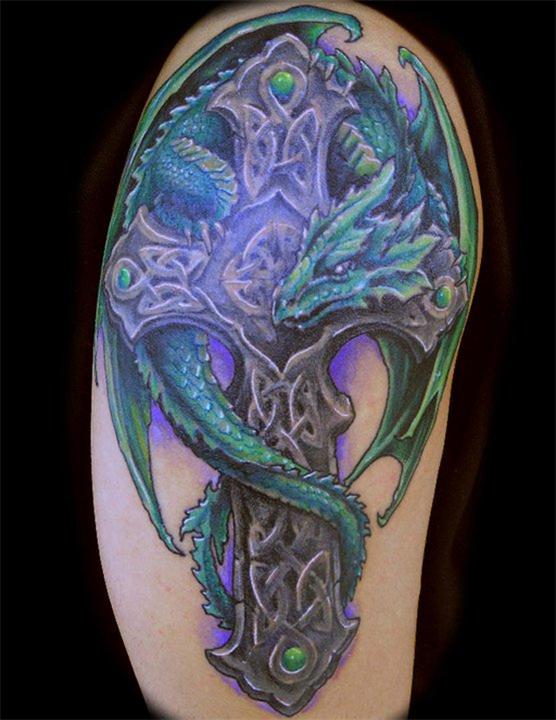 Wonderful Dragon With Celtic Cross Tattoo On Right Half Sleeve