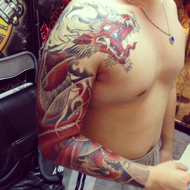 Wonderful Traditional Dragon Tattoo On Man Right Full Sleeve By Bengkel