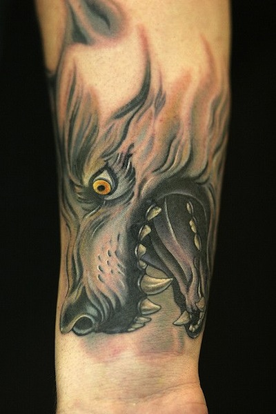 Yellow Eyes Wolf Tattoo On Forearm