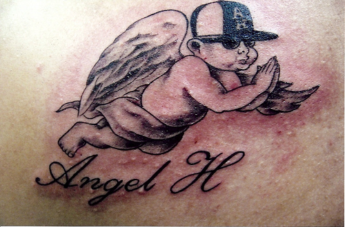 Angel H - Cool Black Ink Flying Baby Angel Tattoo Design