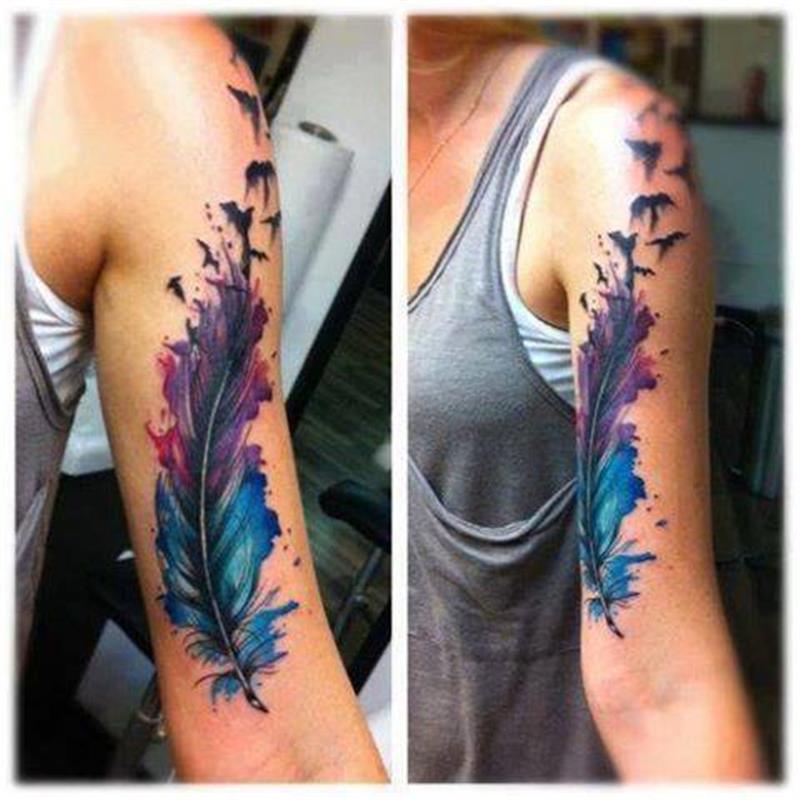 Aqua Feather With Flying Birds Tattoo On Left Bicep