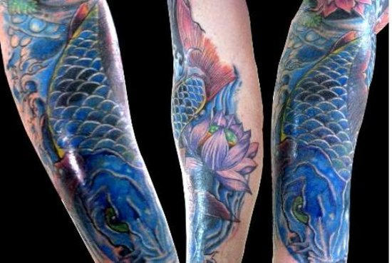 Aqua Koi Fish With Lotus Flower Tattoo Design For Sleeve