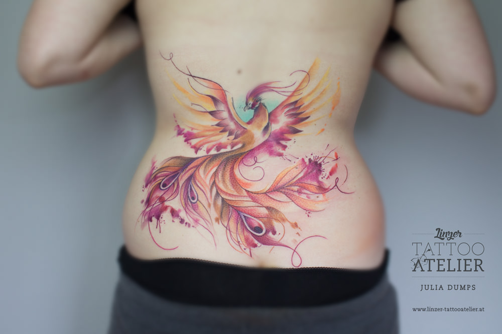 Aqua Phoenix Tattoo On Women Lower Back