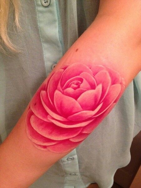 Aqua Pink Ink Flower Tattoo On Left Arm