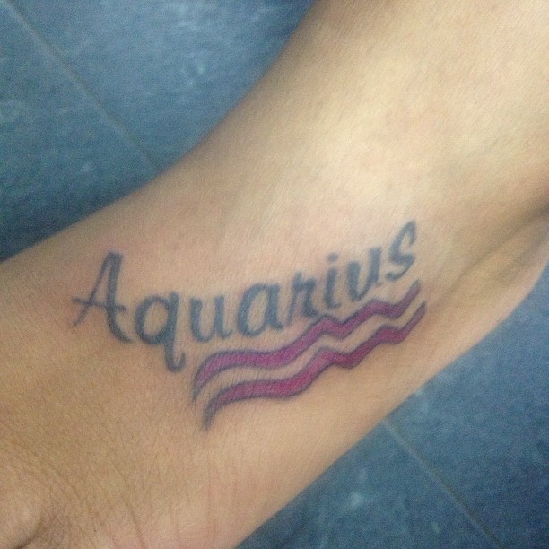 Aquarius - Cool Aquarius Symbol Tattoo On Left Foot