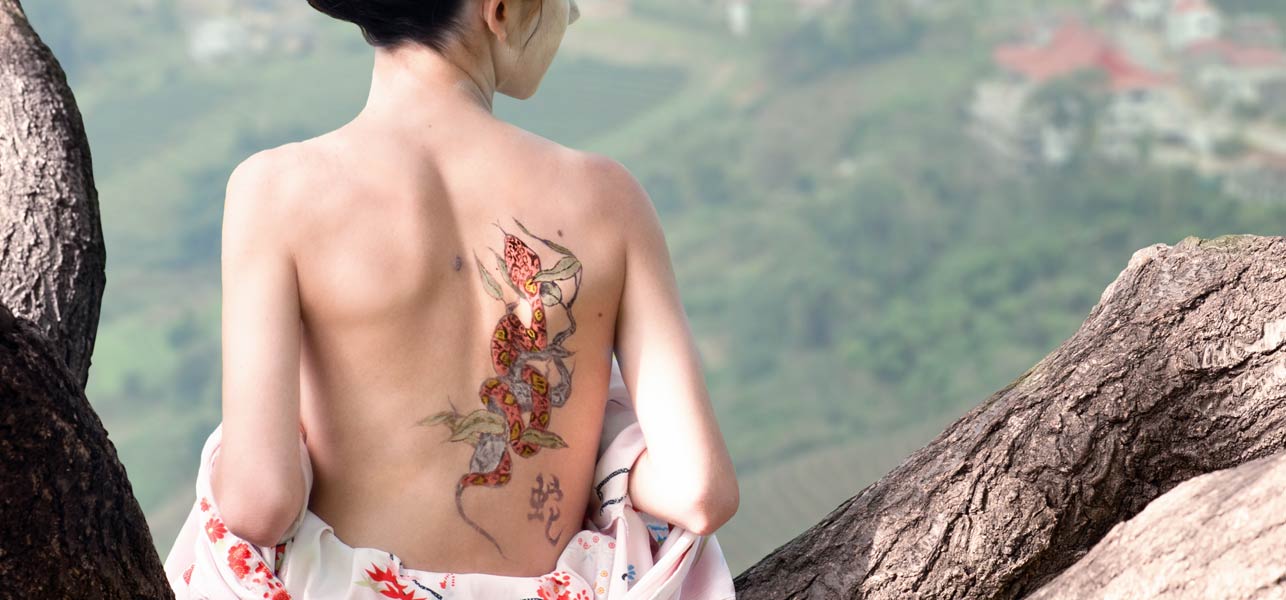 Asian Snake Tattoo On Girl Upper Back