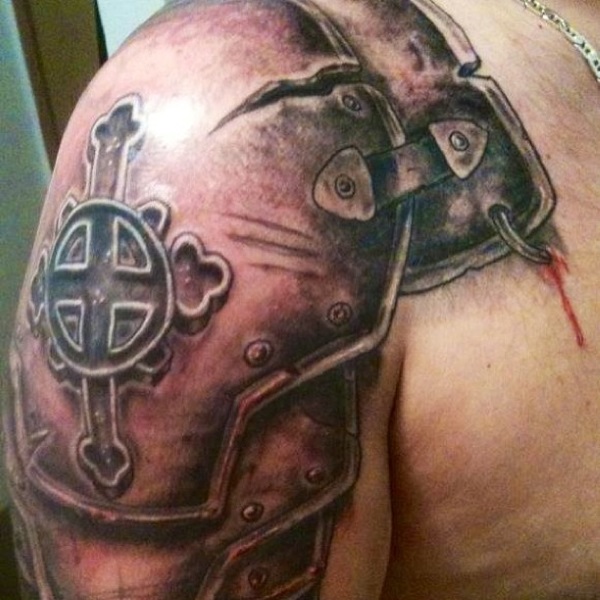 Attractive Black Ink Armor Tattoo On Man Right Shoulder