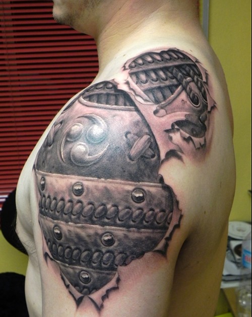 Attractive Black Ink Ripped Skin Armor Tattoo On Man Left Shoulder