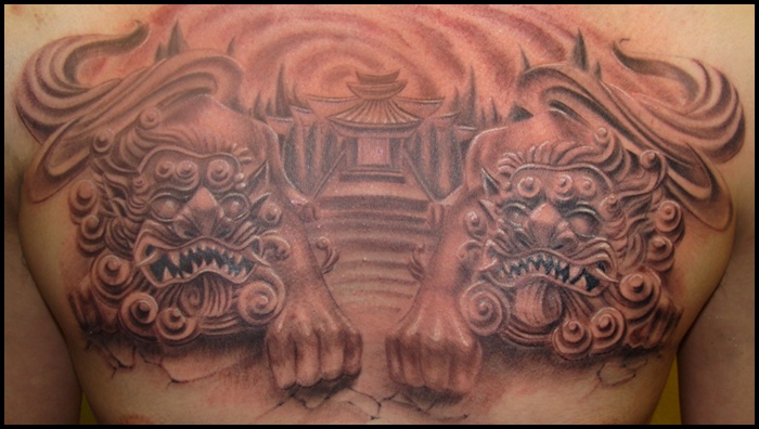 Attractive Black Ink Two Foo Dog Tattoo On Man Chest