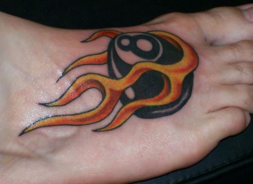 Attractive Eightball In Fire And Flame Tattoo On Right Foot