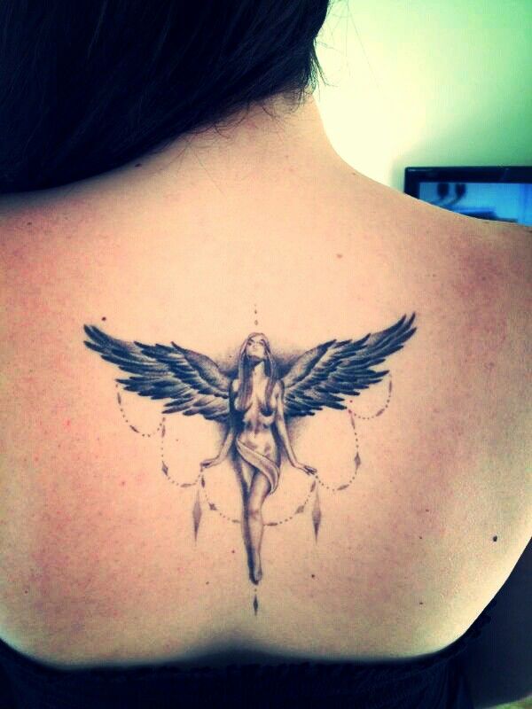 Awesome Black Ink Angel Tattoo On Women Upper Back