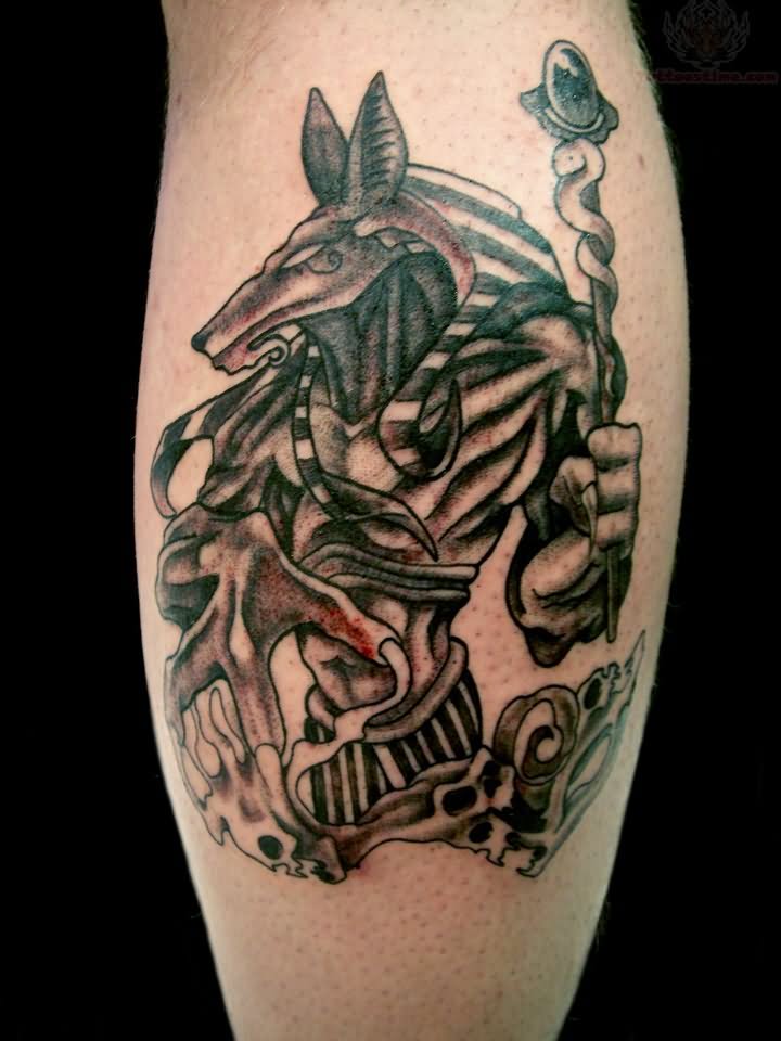 Awesome Black Ink Anubis Tattoo Design For Leg Calf