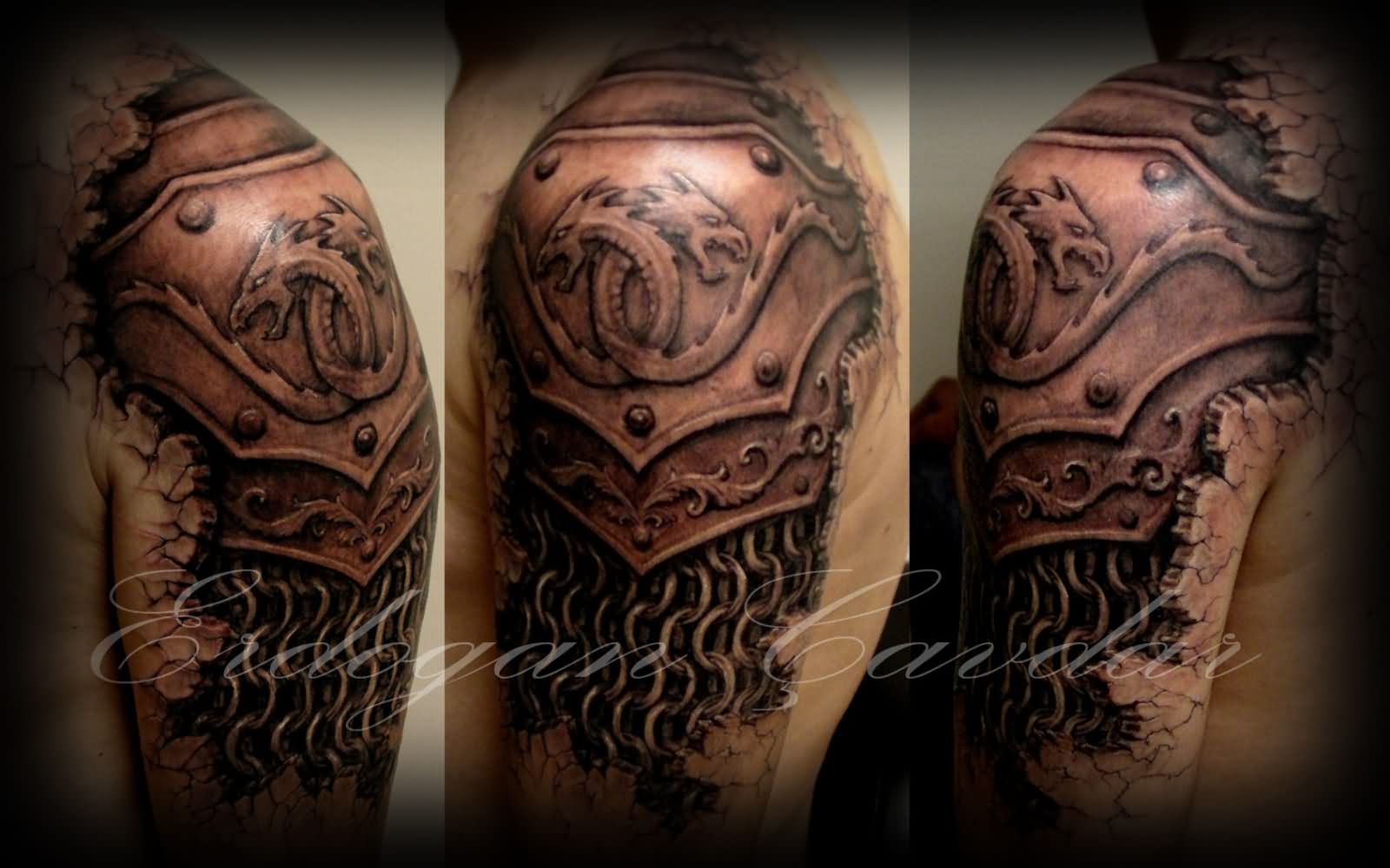 Awesome Black Ink Armor Tattoo On Man Left Shoulder