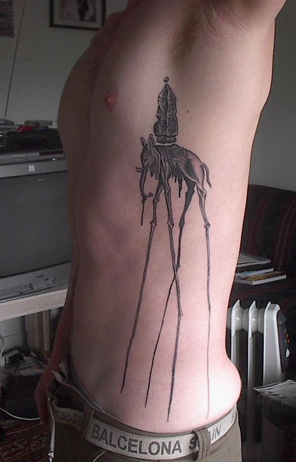Awesome Black Ink Dali Elephant Tattoo On Man Left Side Rib