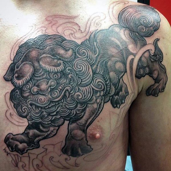 Awesome Black Ink Foo Dog Tattoo On Man Left Chest