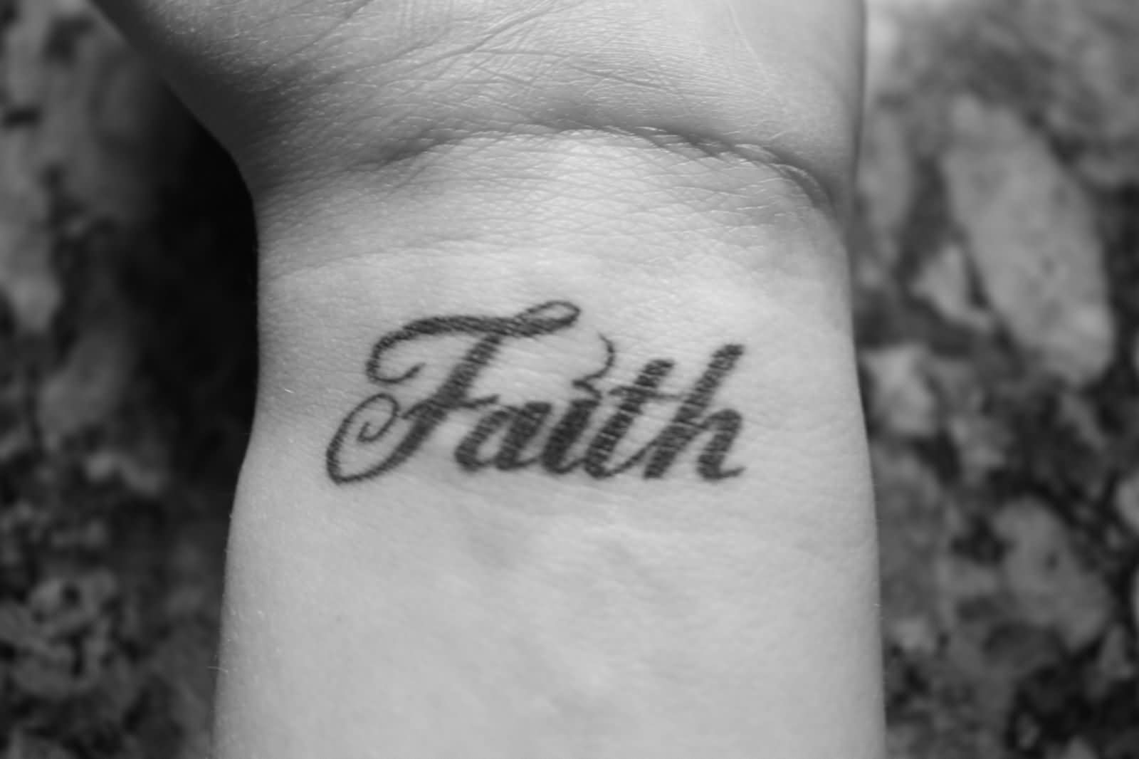 Awesome Faith Lettering Tattoo On Left Wrist