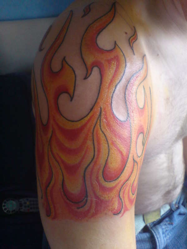 Awesome Fire And Flame Tattoo On Man Right Shoulder