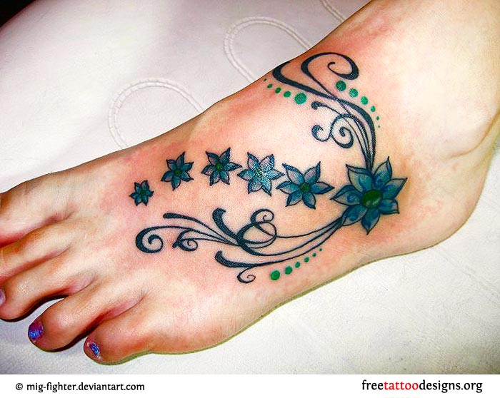 Awesome Flowers Tattoo On Left Foot By Mig Fighter