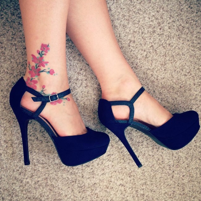 Awesome Flowers Tattoo On Women Right Ankle