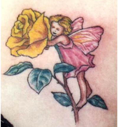 Baby Fairy With Yellow Rose Tattoo Design