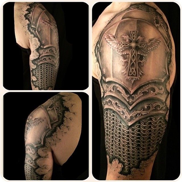 Black And Grey Armor Tattoo On Man Left Half Sleeve