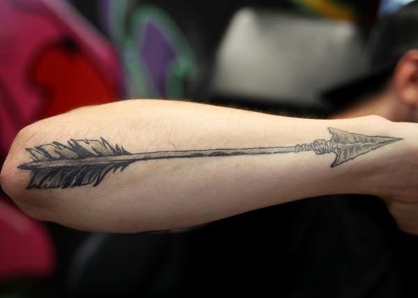Black And Grey Arrow Tattoo On Right Arm
